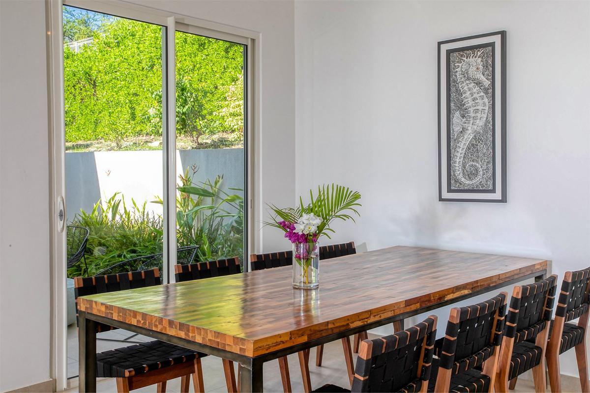 Location villa St Martin - Espace repas intérieur